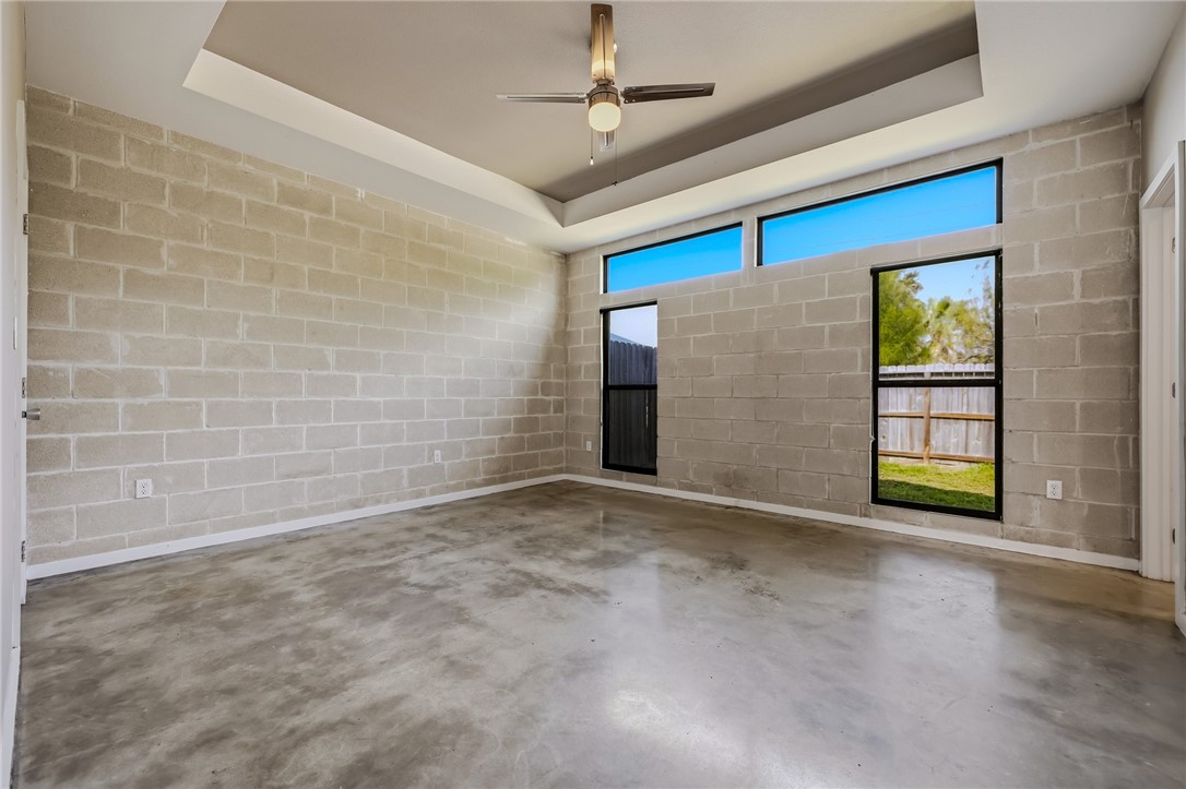 306 Easy Street, Unit B Corpus Christi, TX 78418 - Photo 8 of 24 a view of an empty room with a window