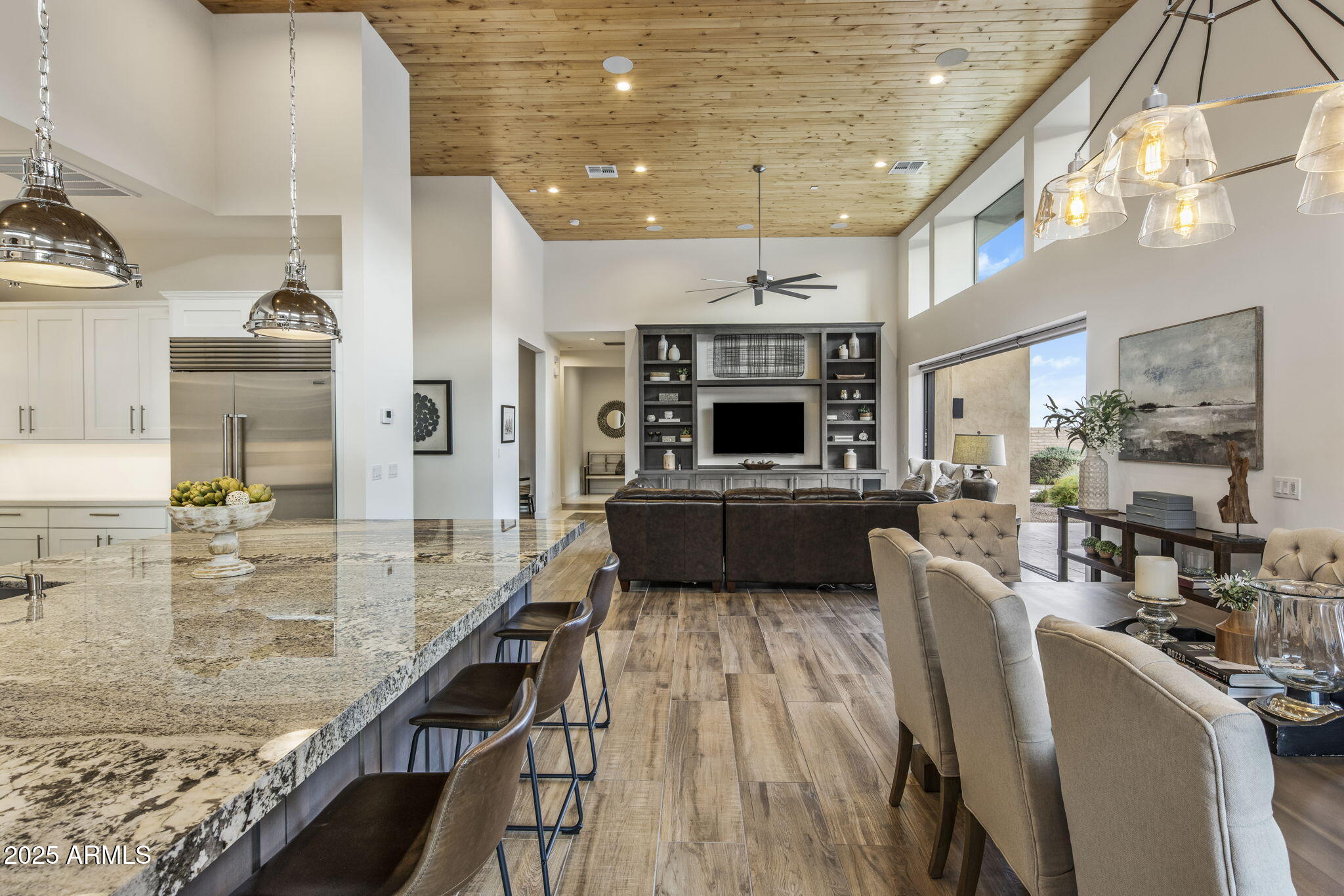 14122 Territory Trail Fountain Hills, AZ 85268 - Photo 13 of 46 a kitchen with stainless steel appliances kitchen island granite countertop a stove and a sink