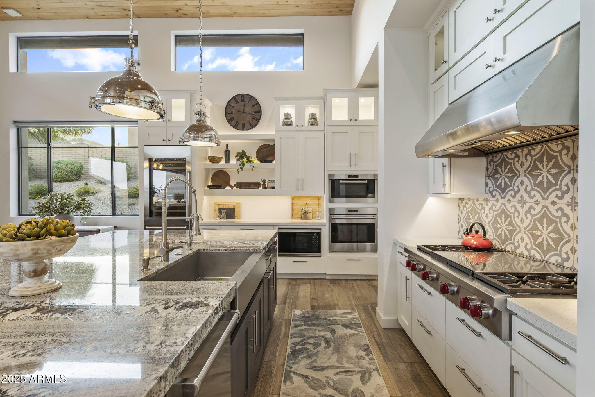 14122 Territory Trail Fountain Hills, AZ 85268 - Photo 15 of 46 a kitchen with stainless steel appliances granite countertop a stove and a sink