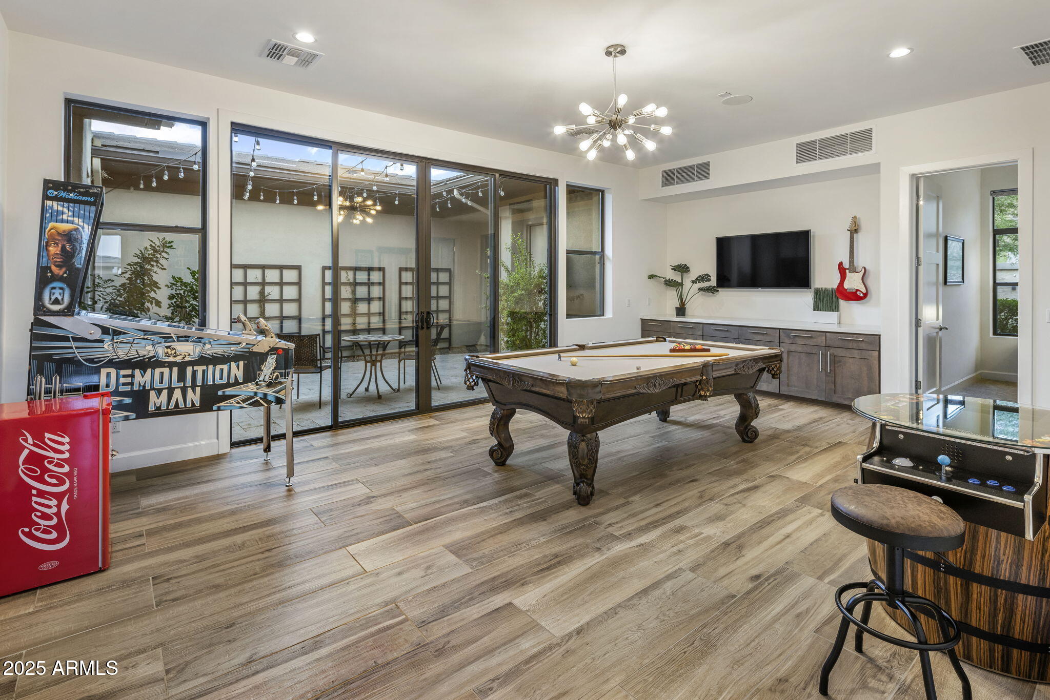 14122 Territory Trail Fountain Hills, AZ 85268 - Photo 19 of 46 a living room with furniture a flat screen tv and a floor to ceiling window