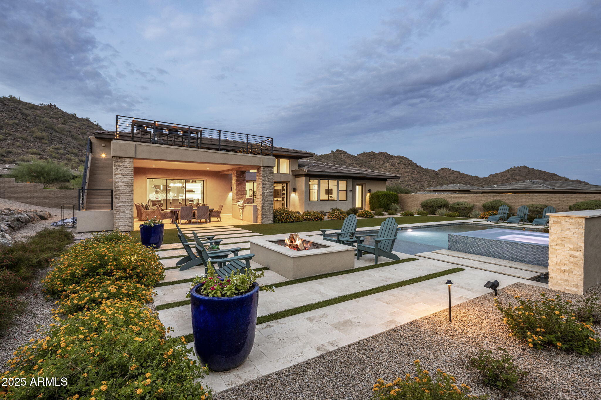 14122 Territory Trail Fountain Hills, AZ 85268 - Photo 34 of 46 a roof deck with table and chairs and potted plants