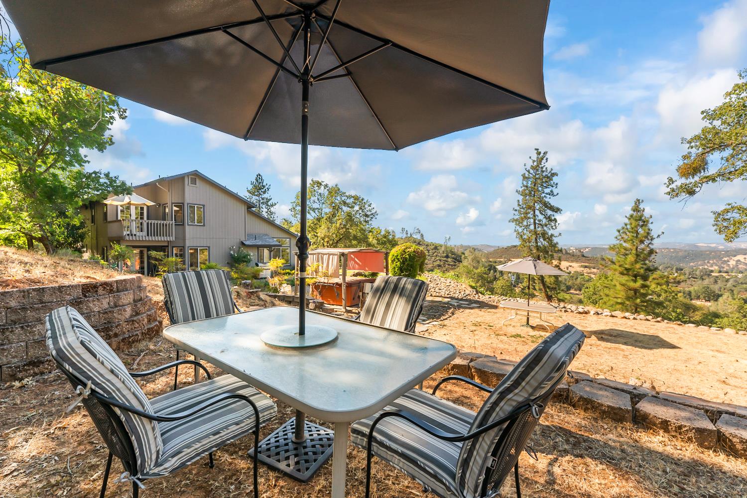 3472 See View Court Rescue, CA 95672 - Photo 34 of 37 a view of a terrace with furniture and stove