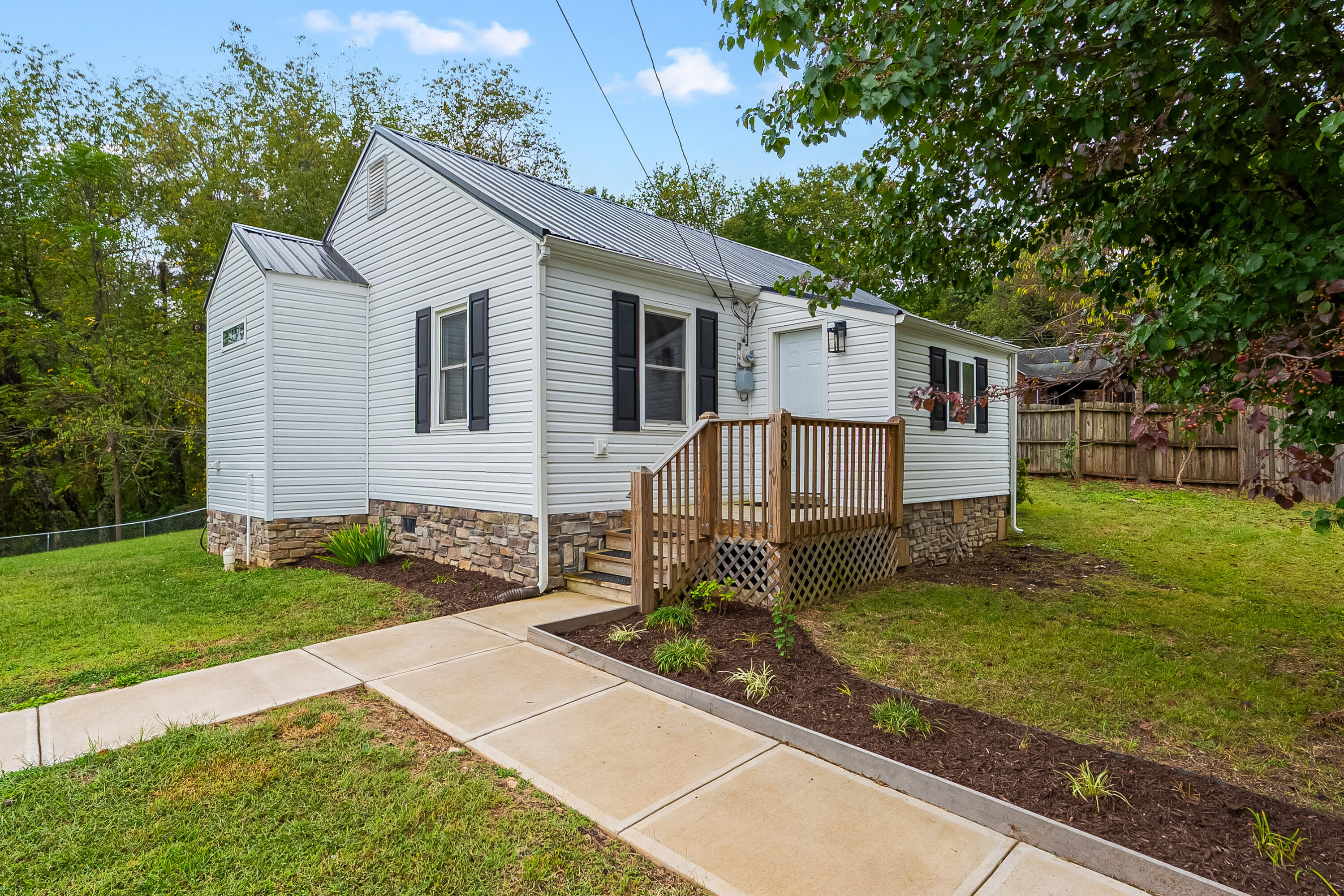 306 Lester Street Radford, VA 24141 - Photo 1 of 51 a view of a house with a yard
