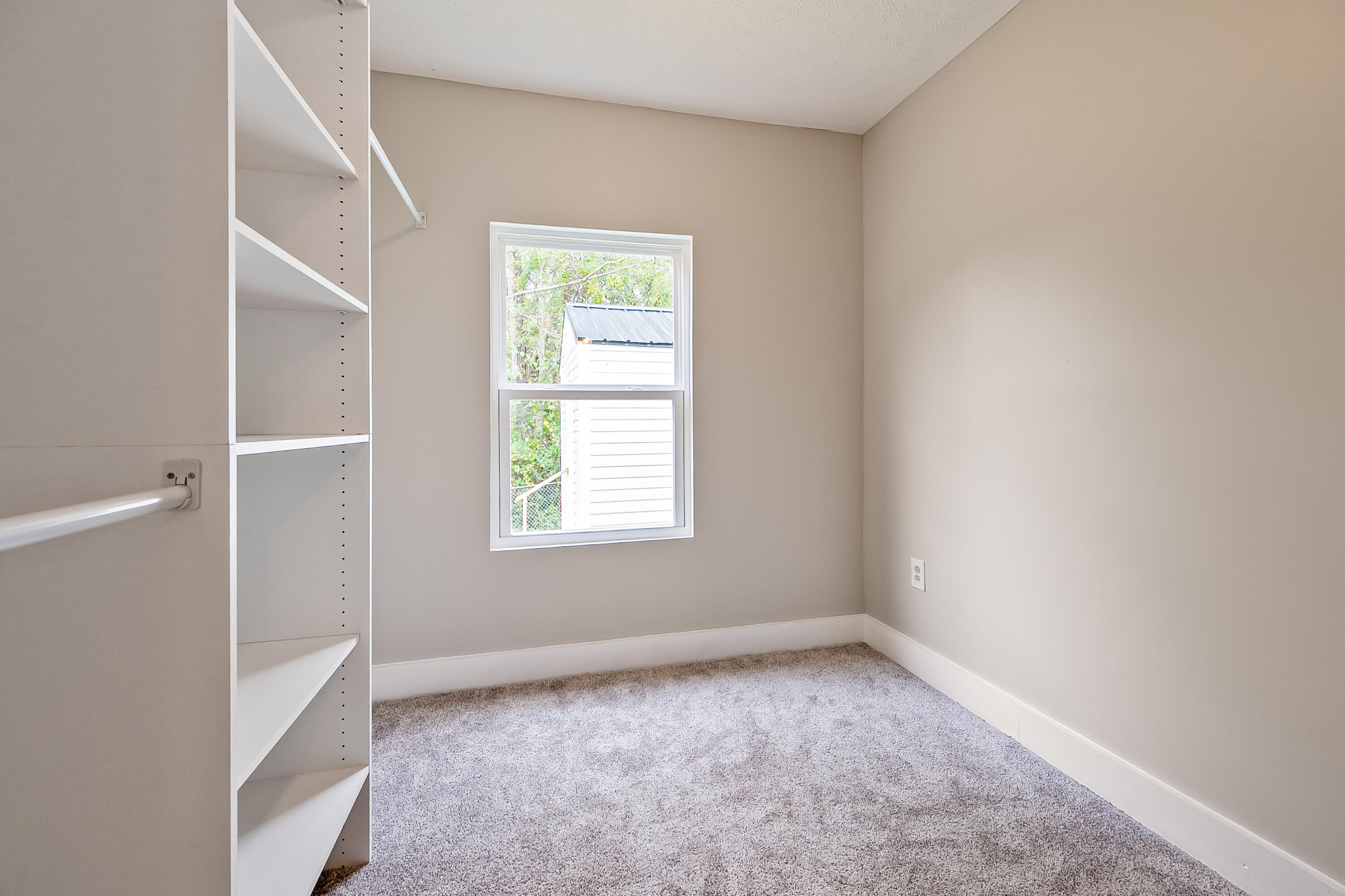 306 Lester Street Radford, VA 24141 - Photo 25 of 51 an empty room with a window