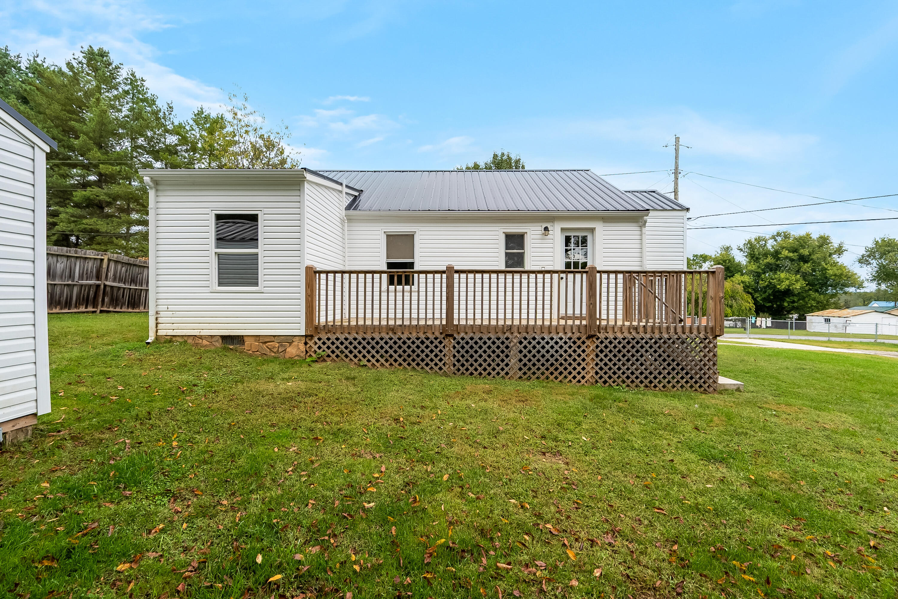 306 Lester Street Radford, VA 24141 - Photo 31 of 51 a view of a house with a yard and deck