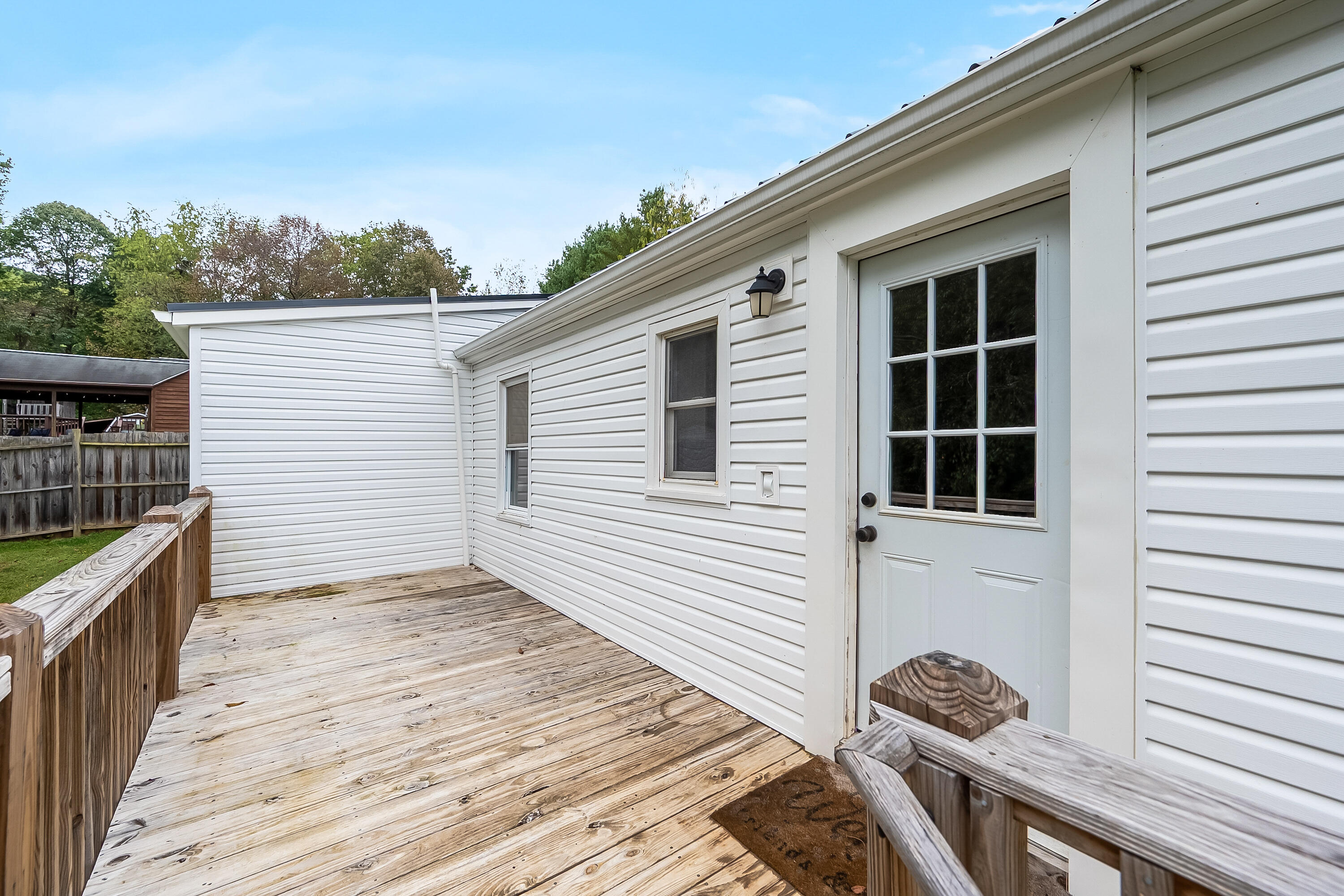 306 Lester Street Radford, VA 24141 - Photo 36 of 51 a view of a house with wooden deck