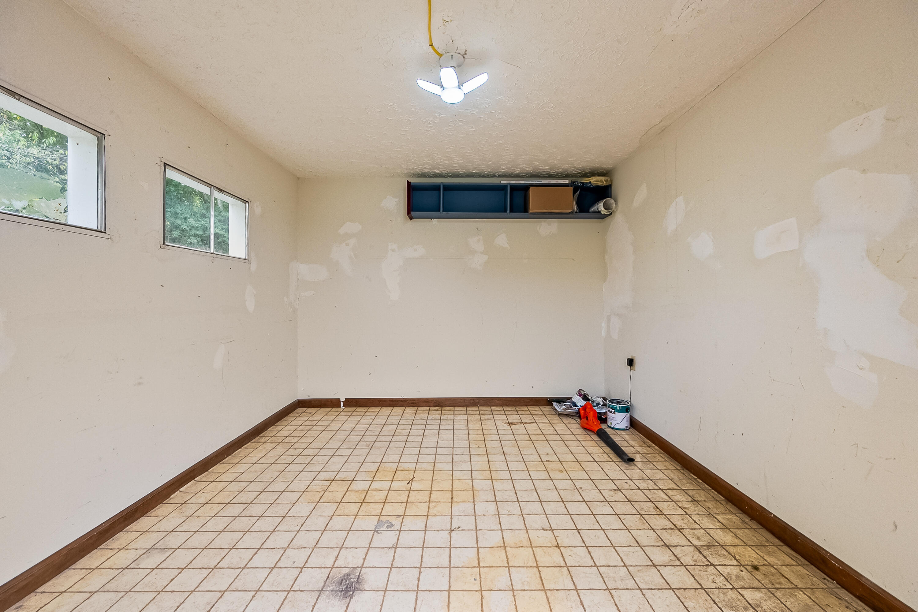 306 Lester Street Radford, VA 24141 - Photo 48 of 51 a view of a room with wooden floor and natural light