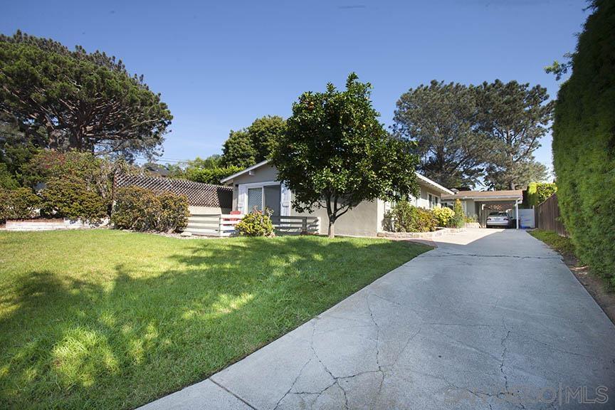 329 9th Street Del Mar, CA 92014 - Photo 2 of 29 a view of a house with garden and a trees