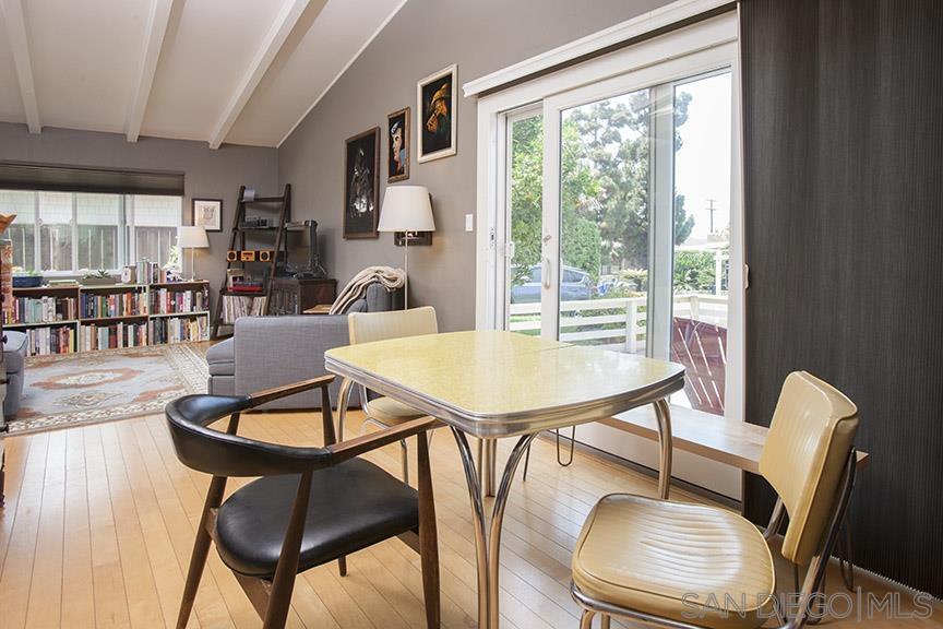 329 9th Street Del Mar, CA 92014 - Photo 11 of 29 a view of a dining room with furniture window and wooden floor