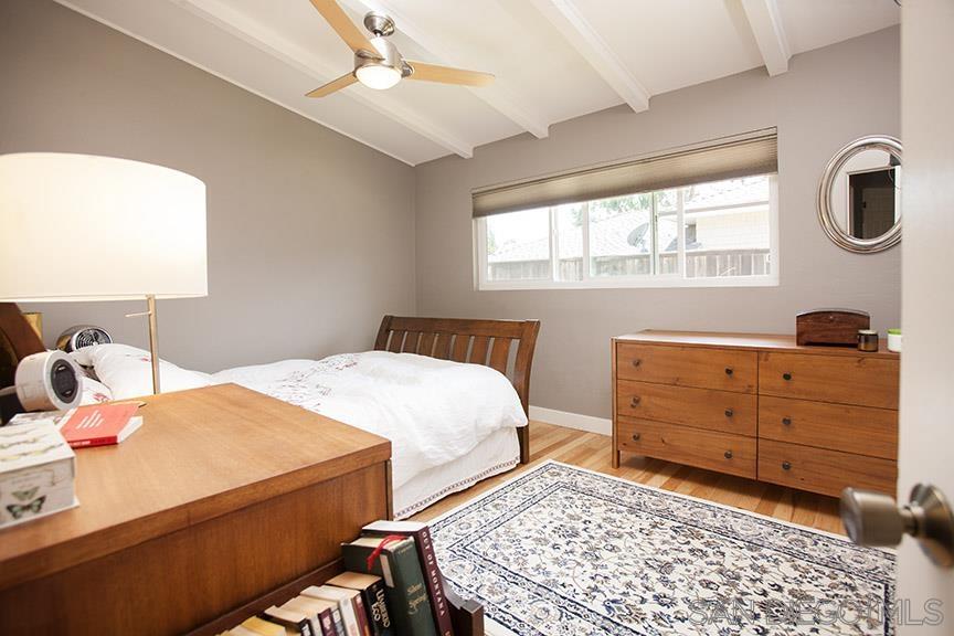 329 9th Street Del Mar, CA 92014 - Photo 15 of 29 a bedroom with a bed and a dresser