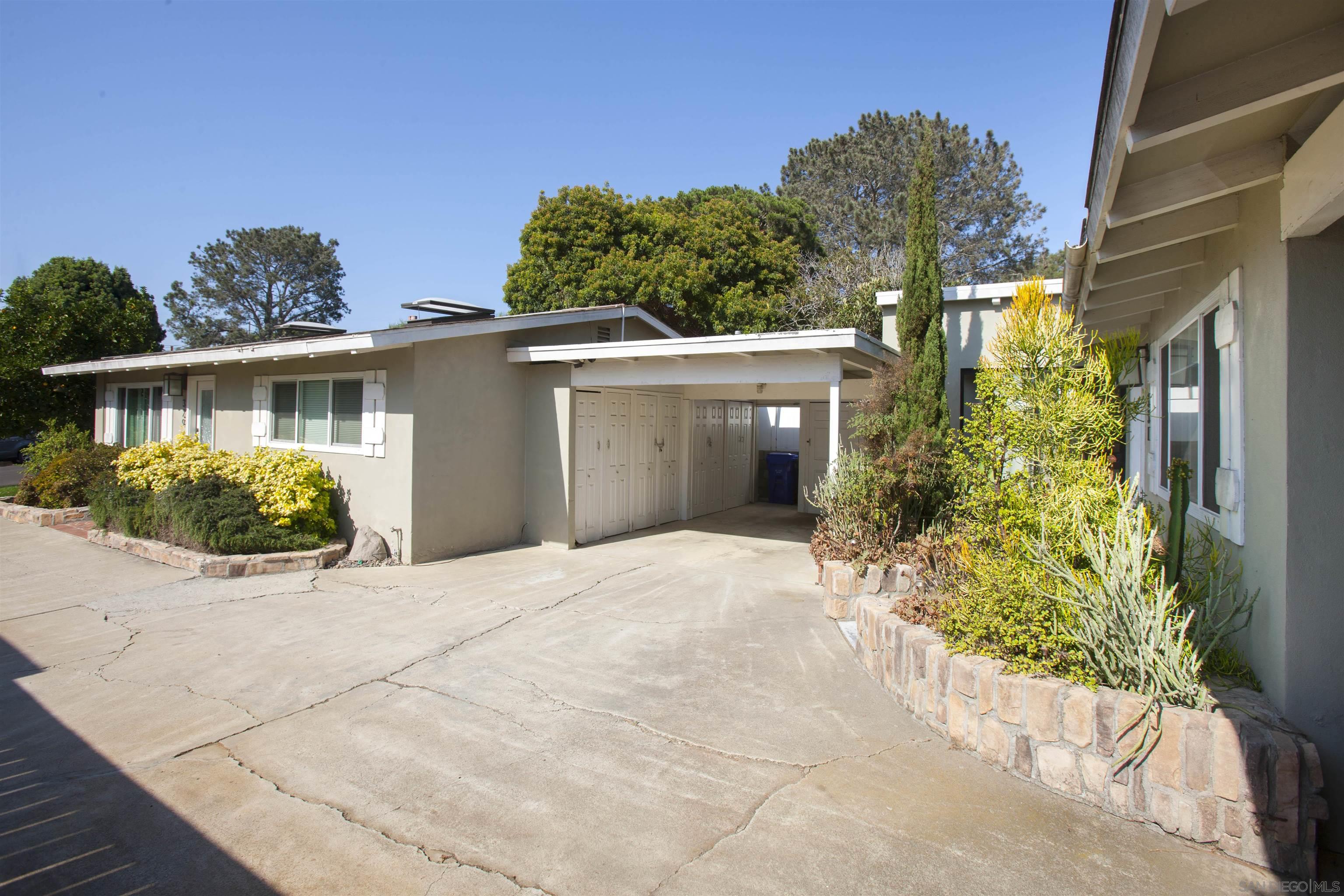 329 9th Street Del Mar, CA 92014 - Photo 3 of 29 a view of a house with a yard and potted plants