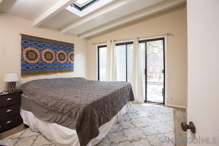 329 9th Street Del Mar, CA 92014 - Photo 25 of 29 a bedroom with a bed and a window