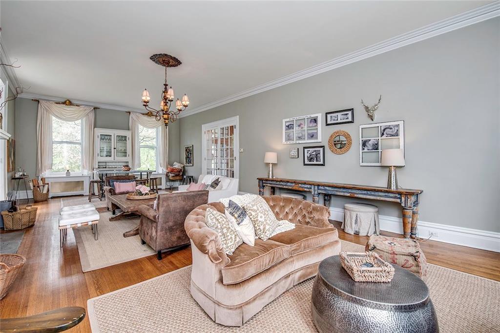 404 Beaver Road Sewickley, PA 15143 - Photo 5 of 24 Over sized living room with built-in bookshelves.