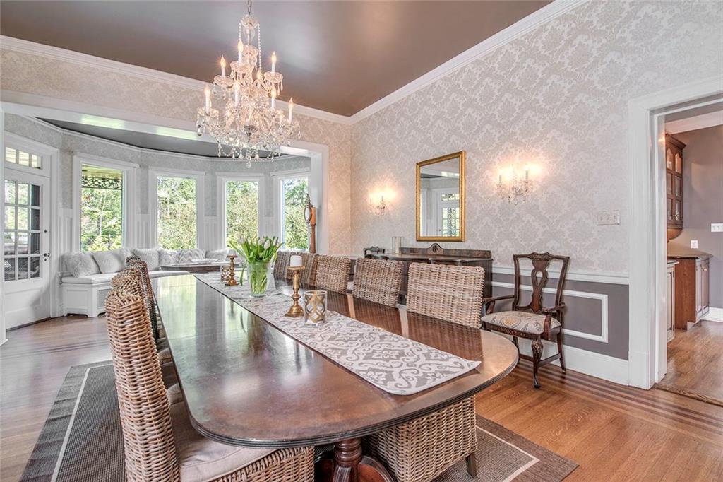 404 Beaver Road Sewickley, PA 15143 - Photo 6 of 24 Gorgeous dining room accented with bay windows and access to the veranda and outside fireplace.