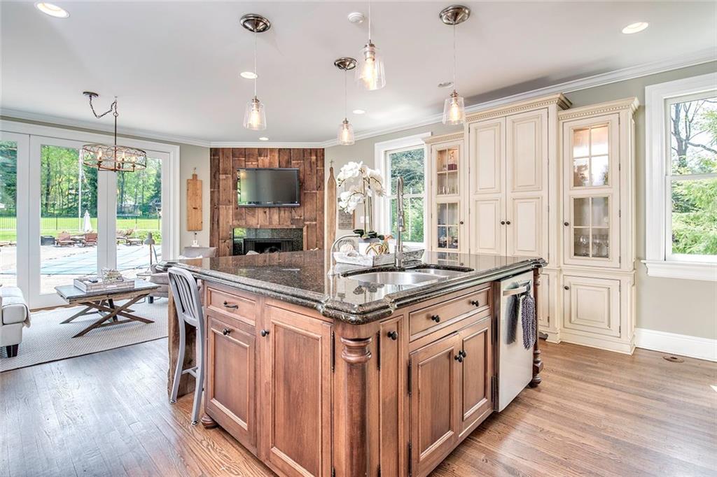 404 Beaver Road Sewickley, PA 15143 - Photo 7 of 24 Spacious kitchen with many windows to enjoy the pool and out door living space.