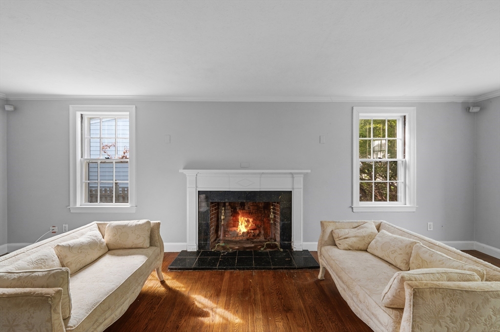 26 Pickwick Road Marblehead, MA 01945 - Photo 7 of 40 a living room with furniture and a fireplace