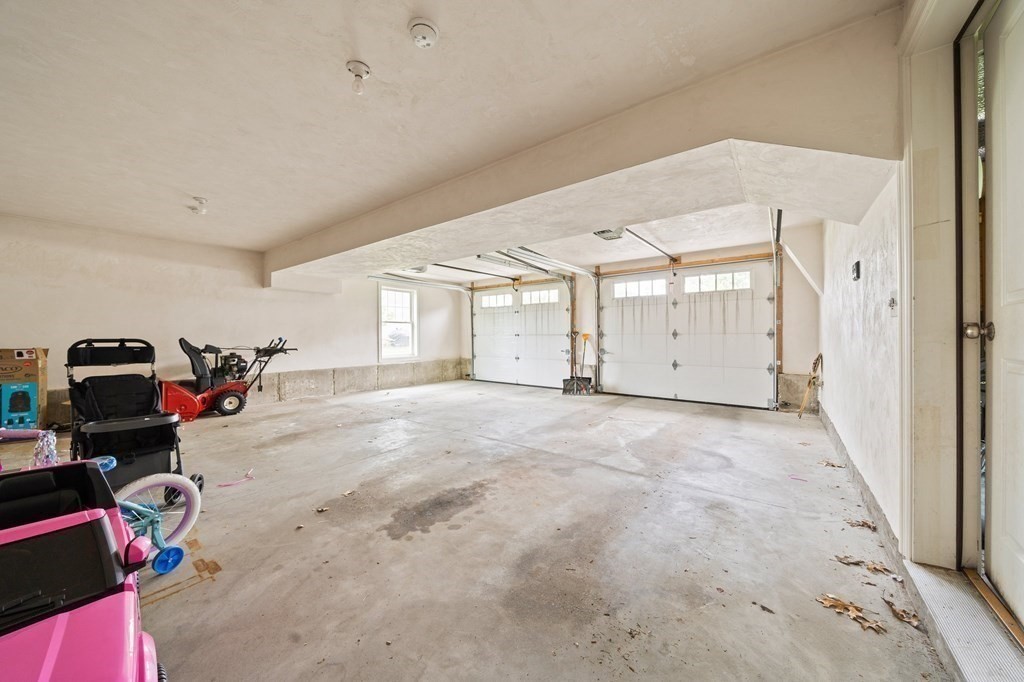 51 Tamarack Road Dracut, MA 01826 - Photo 32 of 39 a view of a garage
