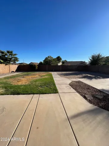 a view of yard with an ocean