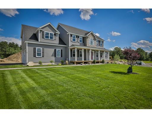 37 Douglas Road Webster, MA 01570 - Photo 9 of 22 a front view of a house with a garden