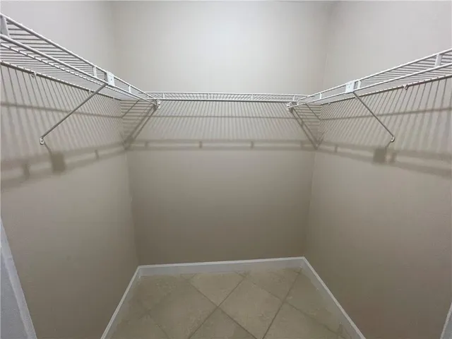 a view of a room with racks on the wall