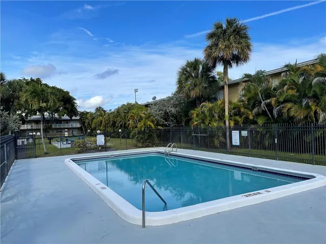 a view of outdoor space and swimming pool