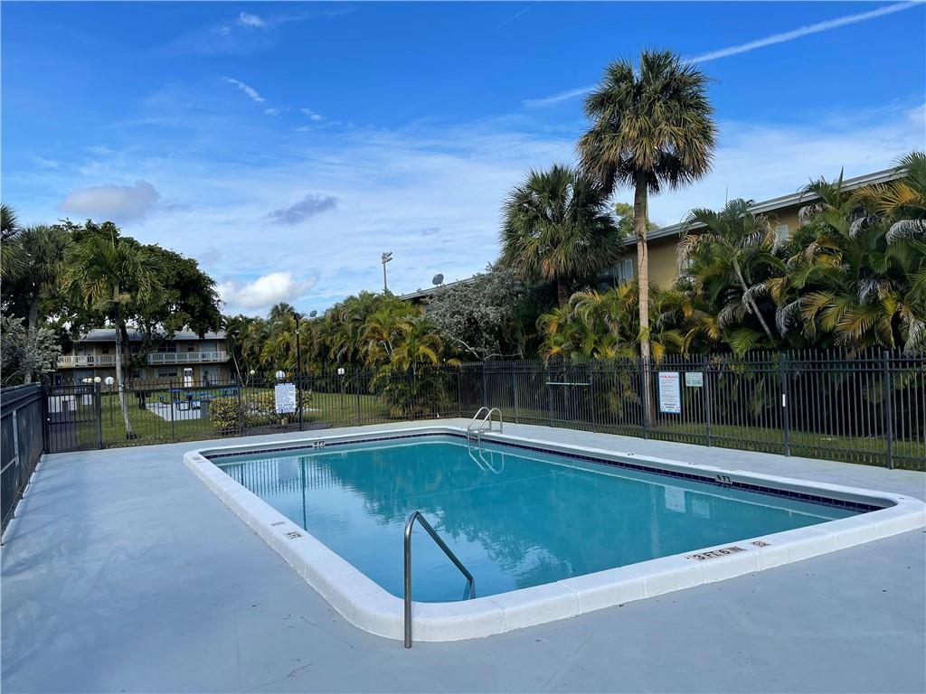 550 Southeast 2nd Avenue, Unit G5 Deerfield Beach, FL 33441 - Photo 4 of 28 a view of outdoor space and swimming pool