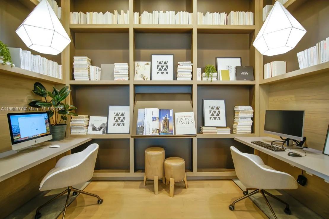 1919 Southeast 10th Avenue, Unit 2121 Fort Lauderdale, FL 33316 - Photo 6 of 35 a room with a workspace