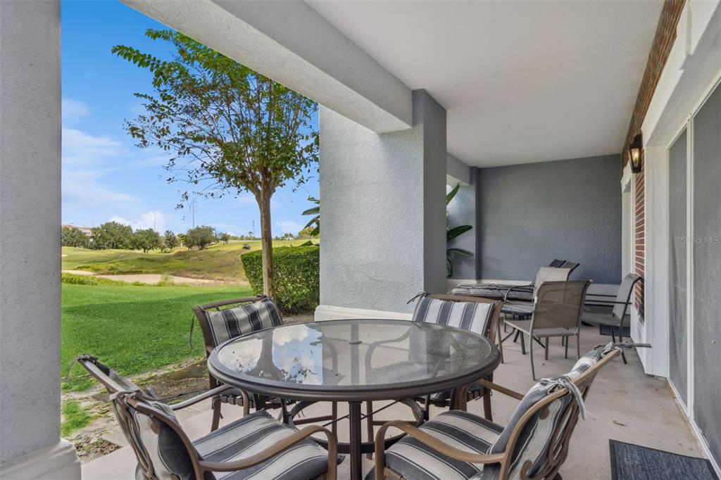 1100 Sunset View Circle, Unit 102 Reunion, FL 34747 - Photo 31 of 67 a view of a dining room with furniture window and outside view