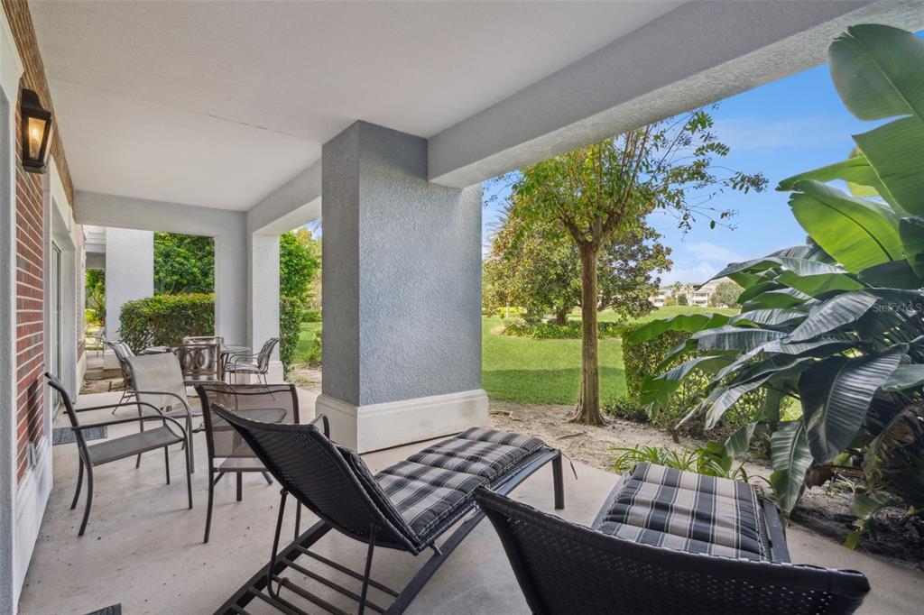 1100 Sunset View Circle, Unit 102 Reunion, FL 34747 - Photo 32 of 67 a view of a dining room with furniture window and outside view