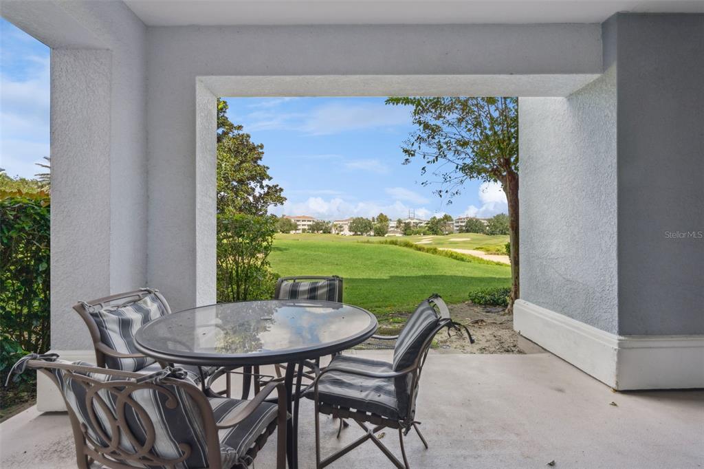 1100 Sunset View Circle, Unit 102 Reunion, FL 34747 - Photo 35 of 67 a view of a dining room with furniture window and outside view