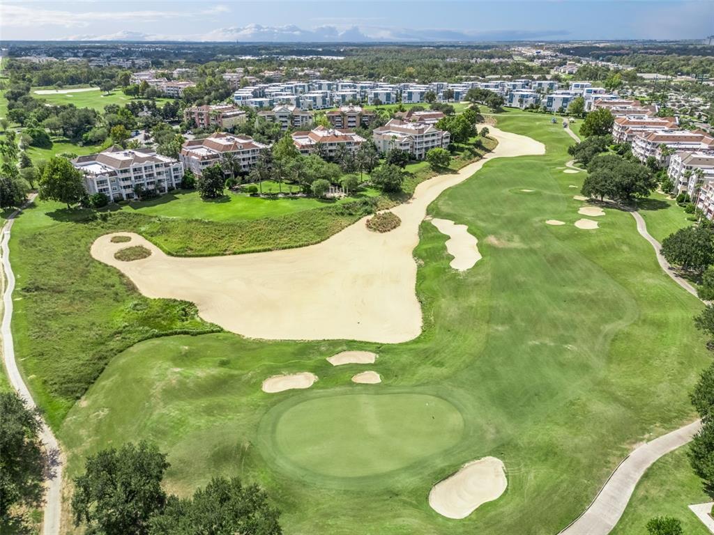 1100 Sunset View Circle, Unit 102 Reunion, FL 34747 - Photo 45 of 67 an aerial view of a residential houses with outdoor space and trees