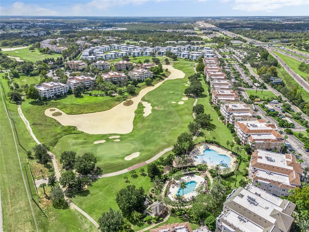 1100 Sunset View Circle, Unit 102 Reunion, FL 34747 - Photo 48 of 67 an aerial view of residential houses with outdoor space