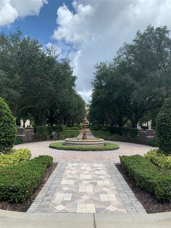 1100 Sunset View Circle, Unit 102 Reunion, FL 34747 - Photo 60 of 67 a view of yard with swimming pool and green space