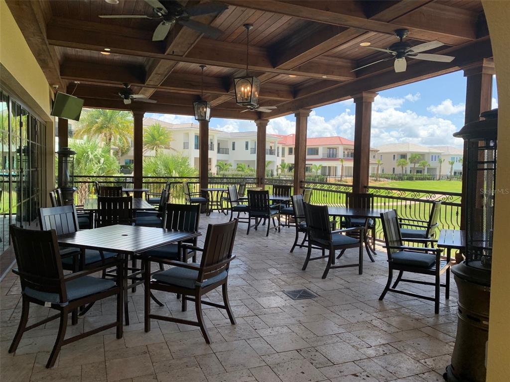 1100 Sunset View Circle, Unit 102 Reunion, FL 34747 - Photo 67 of 67 a view of a dining room with furniture window and outside view
