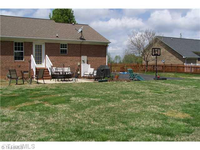 2200 Farrell Road Mebane, NC 27302 - Photo 12 of 13 Patio/Deck. What a wonderful place to hang out and watch the kids play in the large backyard