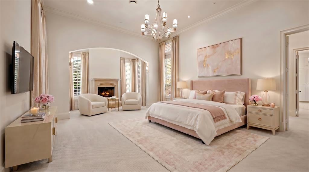6900 Rockingham Court Colleyville, TX 76034 - Photo 14 of 40 Spacious room featuring vaulted ceilings, a prominent chandelier, an arched alcove with a corner fireplace, and plantation shutters. Ai staged.