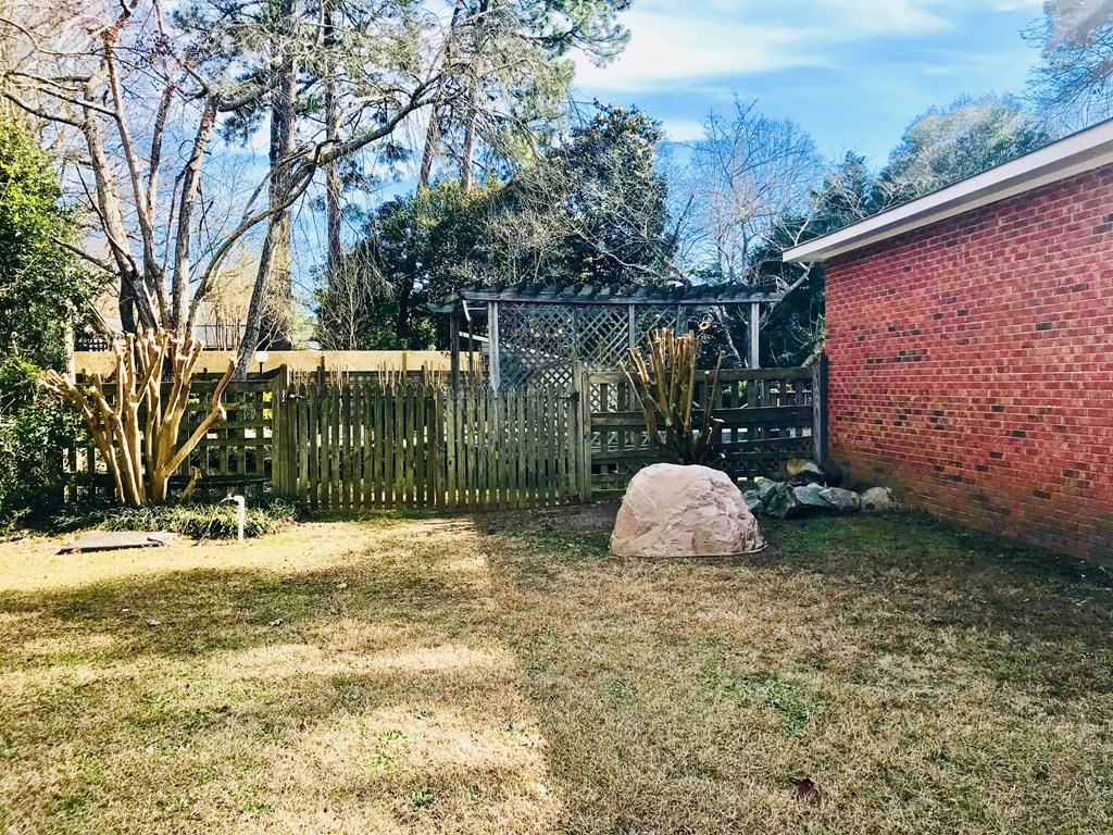 102 Valley Ridge Drive Perry, GA 31069 - Photo 2 of 25 a backyard of a house with lots of green space