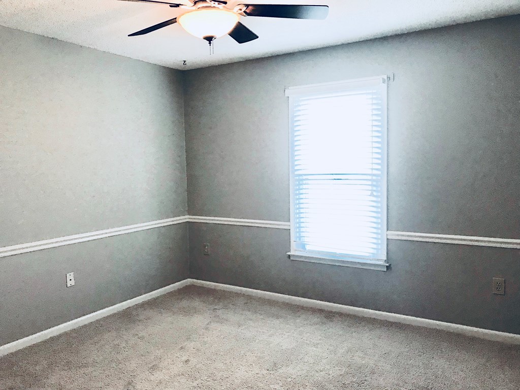 102 Valley Ridge Drive Perry, GA 31069 - Photo 14 of 25 an empty room with a window