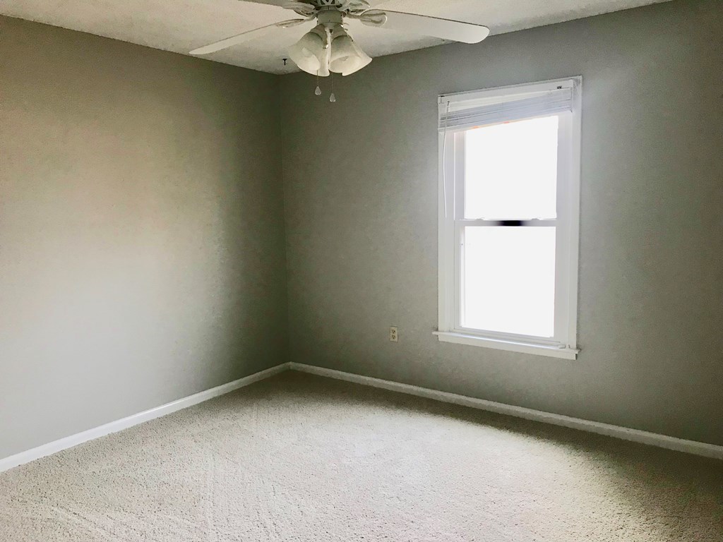 102 Valley Ridge Drive Perry, GA 31069 - Photo 17 of 25 an empty room with a window