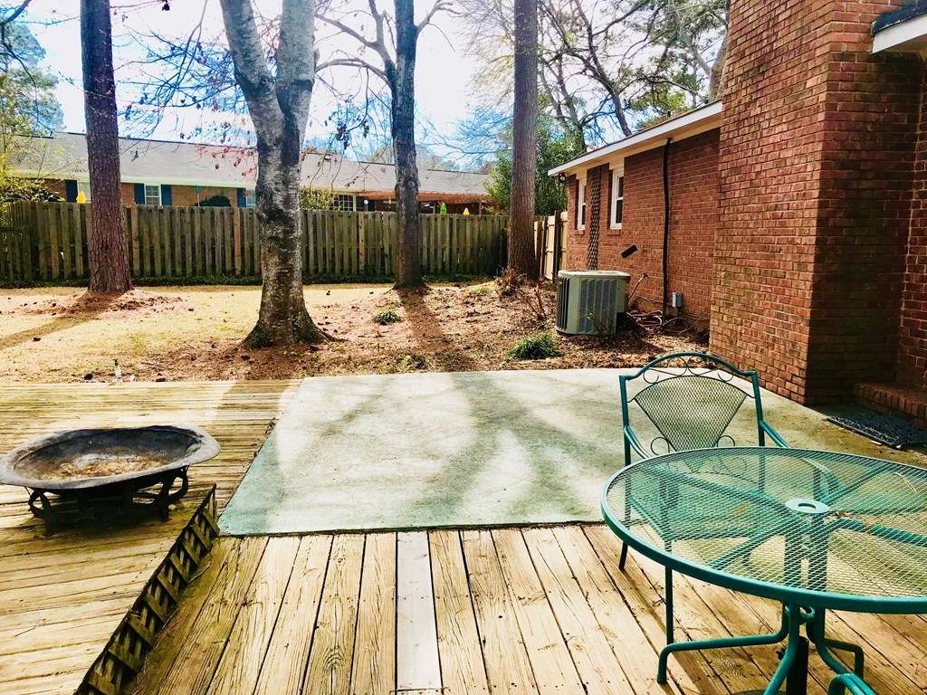 102 Valley Ridge Drive Perry, GA 31069 - Photo 22 of 25 a view of a swimming pool with a patio and a chairs