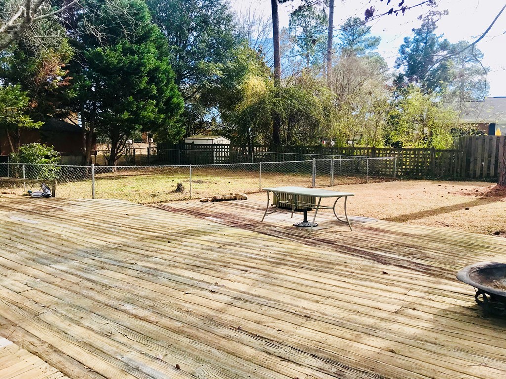 102 Valley Ridge Drive Perry, GA 31069 - Photo 23 of 25 a view of a swimming pool with a bench