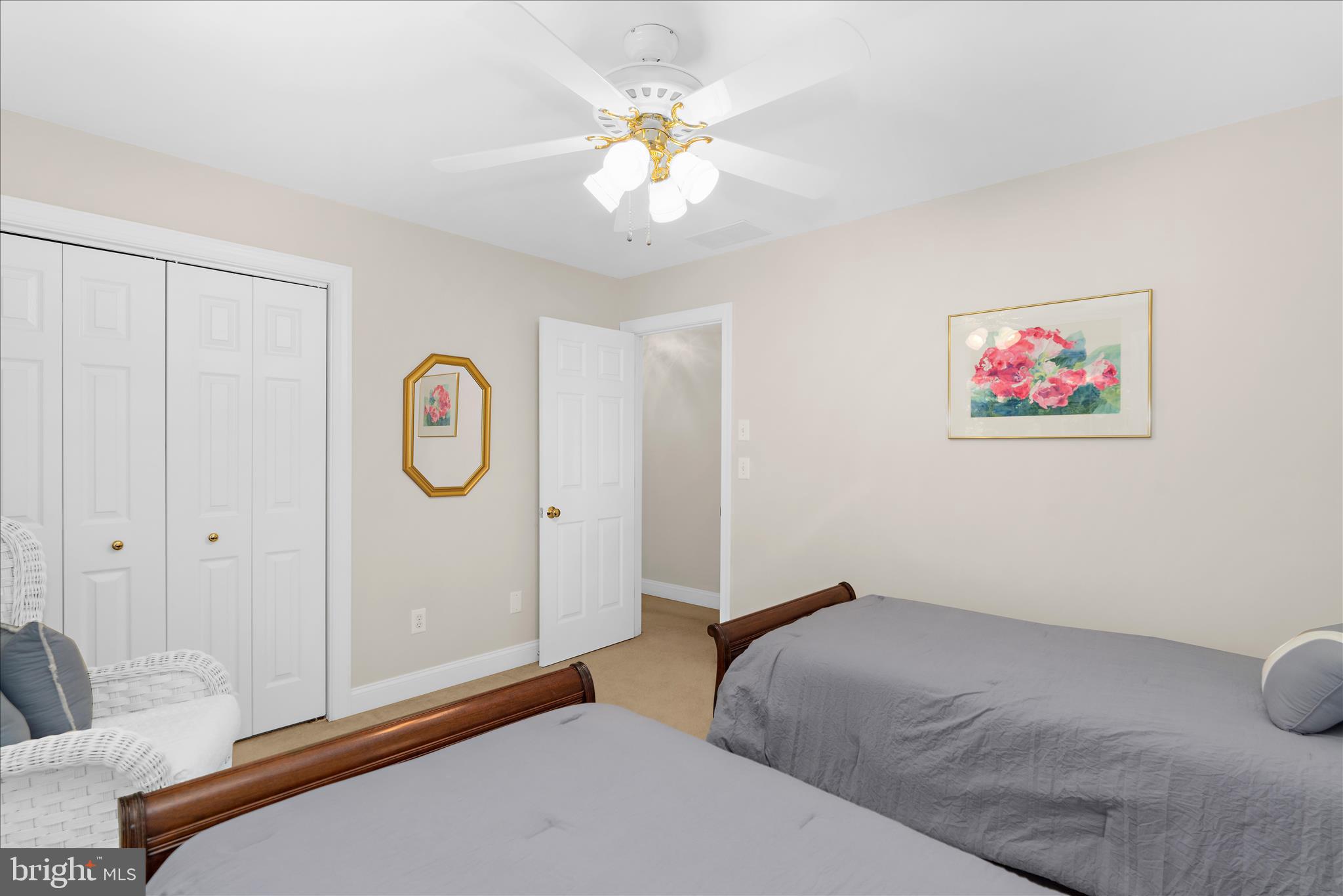 1848 Cherry Road Annapolis, MD 21409 - Photo 22 of 57 a bedroom with bed and a chandelier