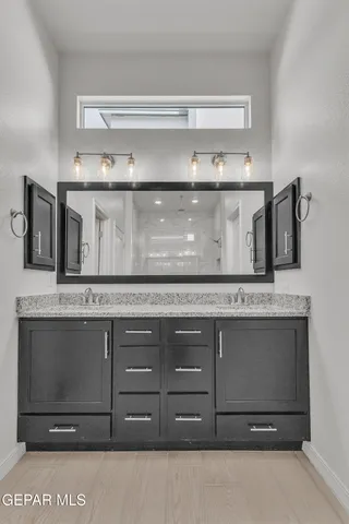 a view of granite countertop cabinets