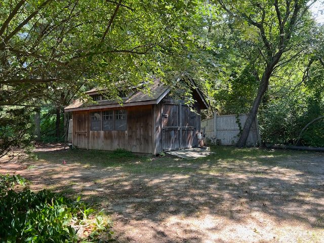 60 R Carol Lane Oak Bluffs, MA 02557 - Photo 14 of 14 a backyard of a house with lots of green space