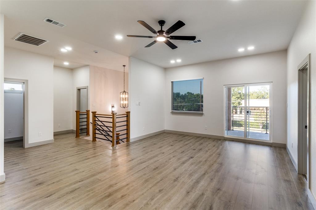 917 South Carroll Avenue Dallas, TX 75223 - Photo 9 of 30 Living area with light wood finished floors, recessed lighting, a chandelier, and ceiling fan