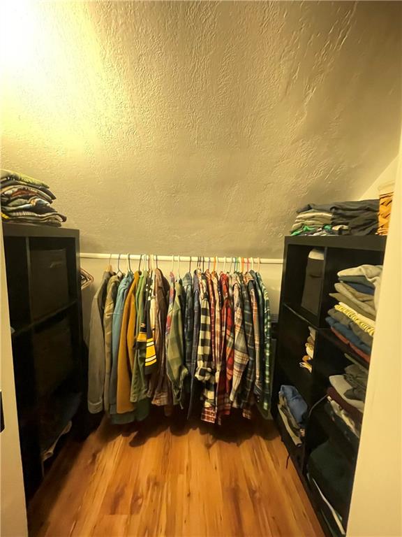 462 Mecklem Avenue Rochester, PA 15074 - Photo 12 of 18 a view of walk in closet with clothes and shoes