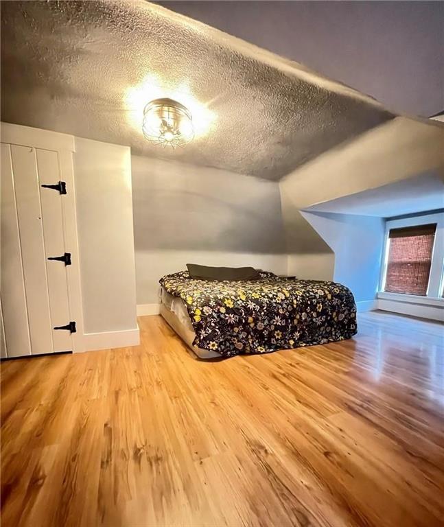 462 Mecklem Avenue Rochester, PA 15074 - Photo 13 of 18 a view of a room with wooden floor