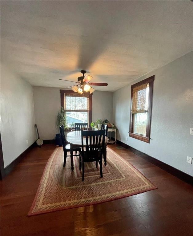 462 Mecklem Avenue Rochester, PA 15074 - Photo 8 of 18 a dining room with furniture a chandelier and wooden floor