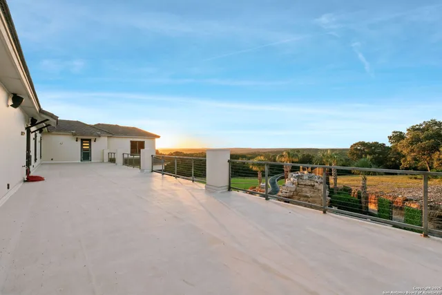 a view of a terrace with a lake