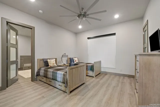 a view of a livingroom with furniture and wooden floor